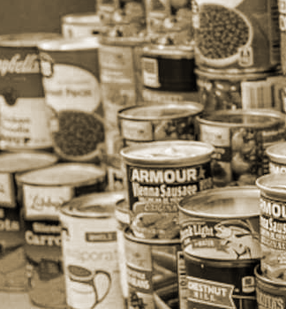 Photo of cans of food at a food drive.