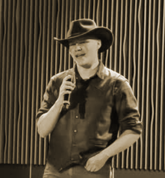 Photo of a student singning at Open Mic Night.